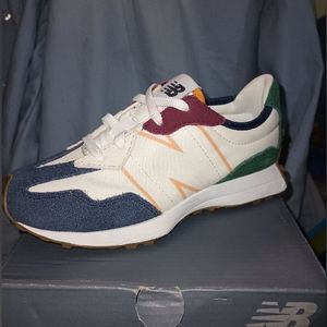 A Pair of New Balance 327, size 13 in a basic white color and multi color accent